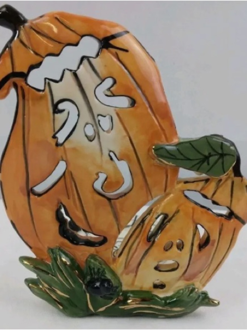Festive Orange Ceramic Jack-O'-Lantern Pair with Green Leaf Accents